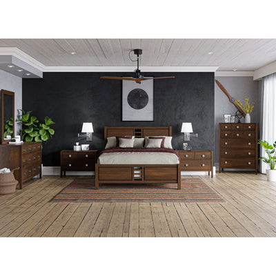 Modern walnut bedroom set with a slat-panel bed, two nightstands, tall chest and dresser in a wood-floored room