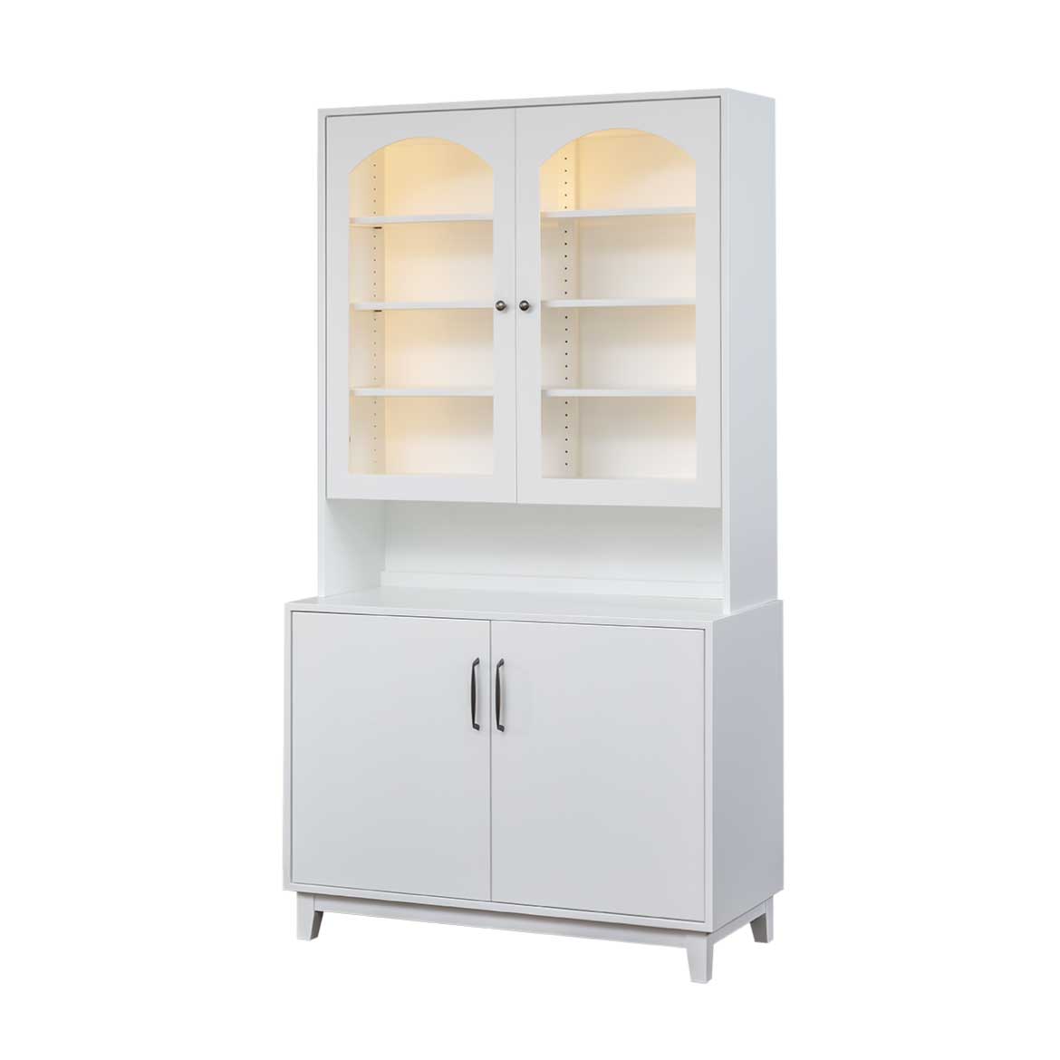 White mid century dining hutch with two arched glass doors over lighted shelves and a two door base cabinet on white