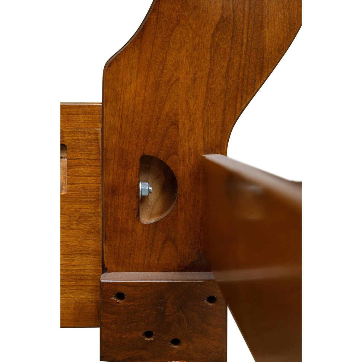 Close-up of the bed post hardware with a hex nut in a recessed pocket and drilled leg block