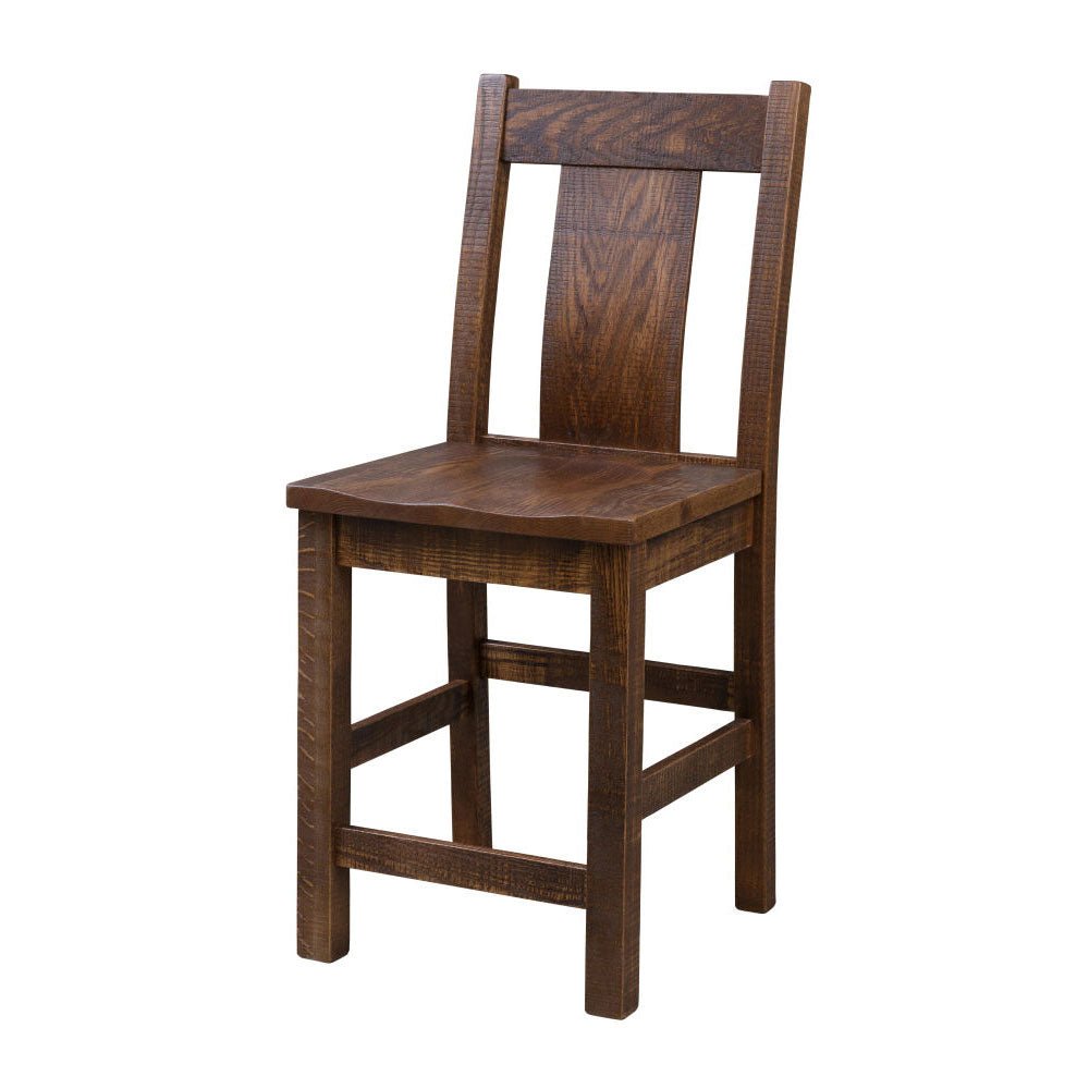 Weathered gray counter height table with four matching stools and dark seats in a bright dining room with tulips
