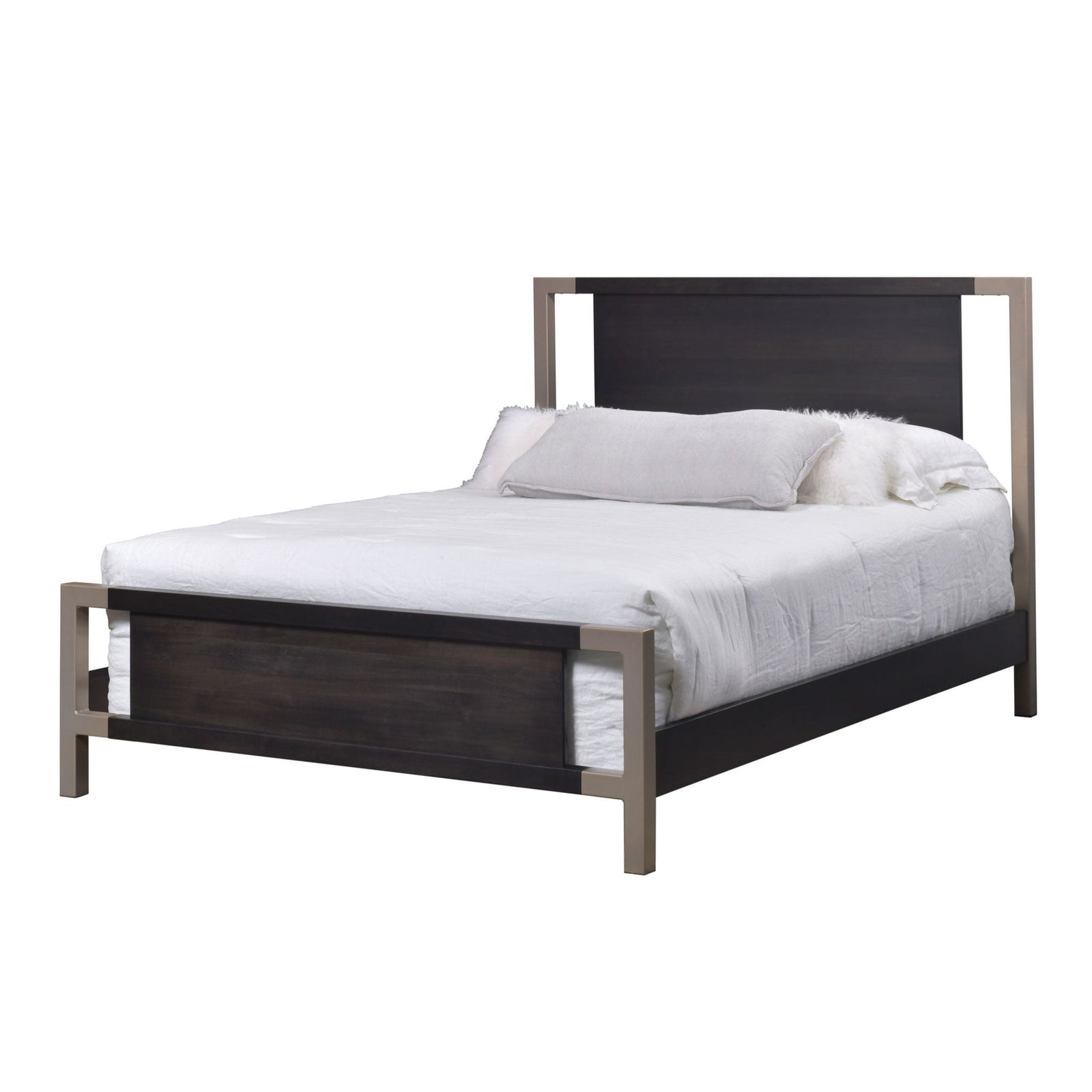 Metal-framed platform bed with a dark wood headboard and footboard panels and white bedding in a city loft