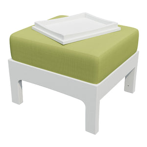 White framed poly patio ottoman with a green cushion and a white square tray tucked on top