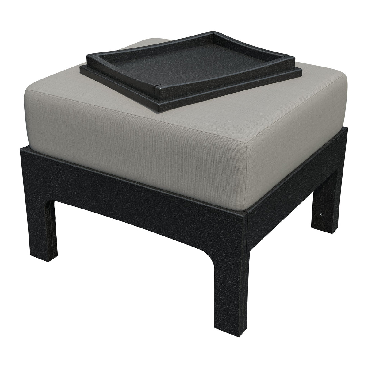 Angled view of the black poly ottoman with light gray cushion and black tray with raised rim