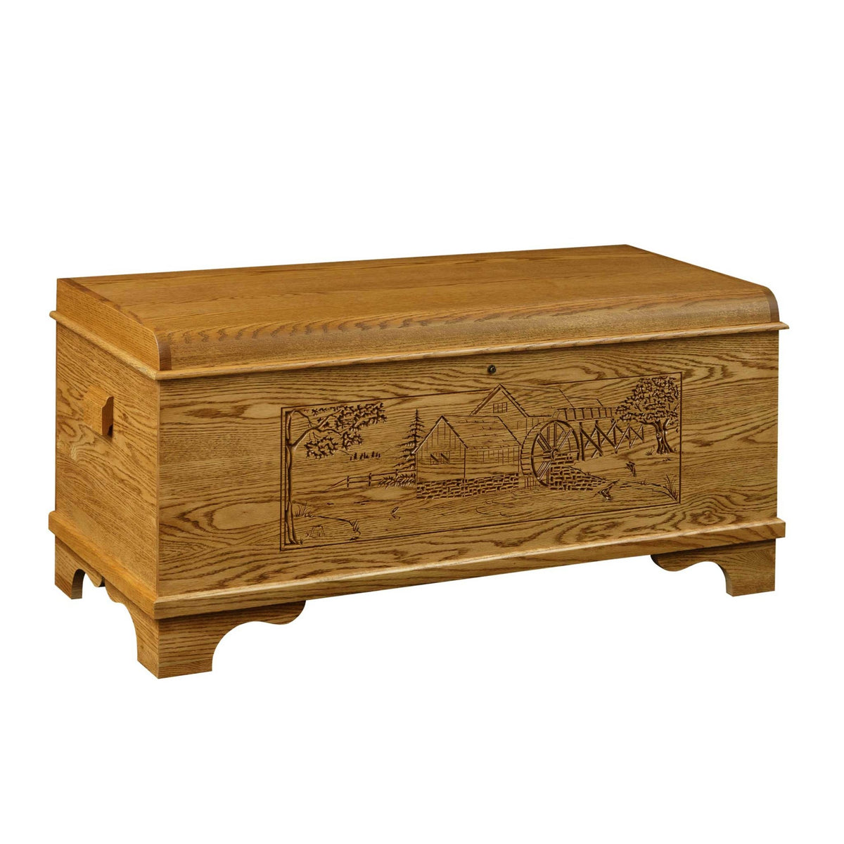 Oak hope chest carved with a country water mill and farm scene, waterfall lid and side carry handle