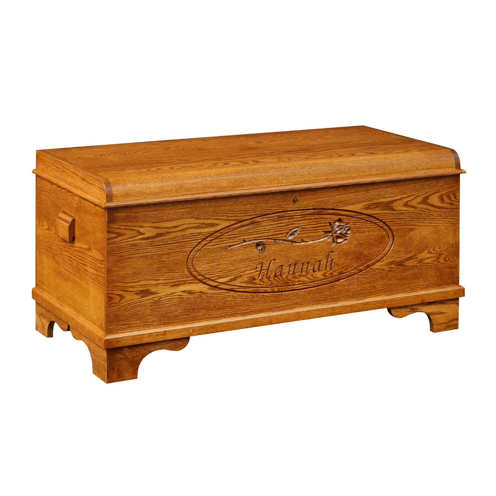 Oak hope chest with a carved oval rose and the name Hannah on the front, waterfall lid and bracket feet