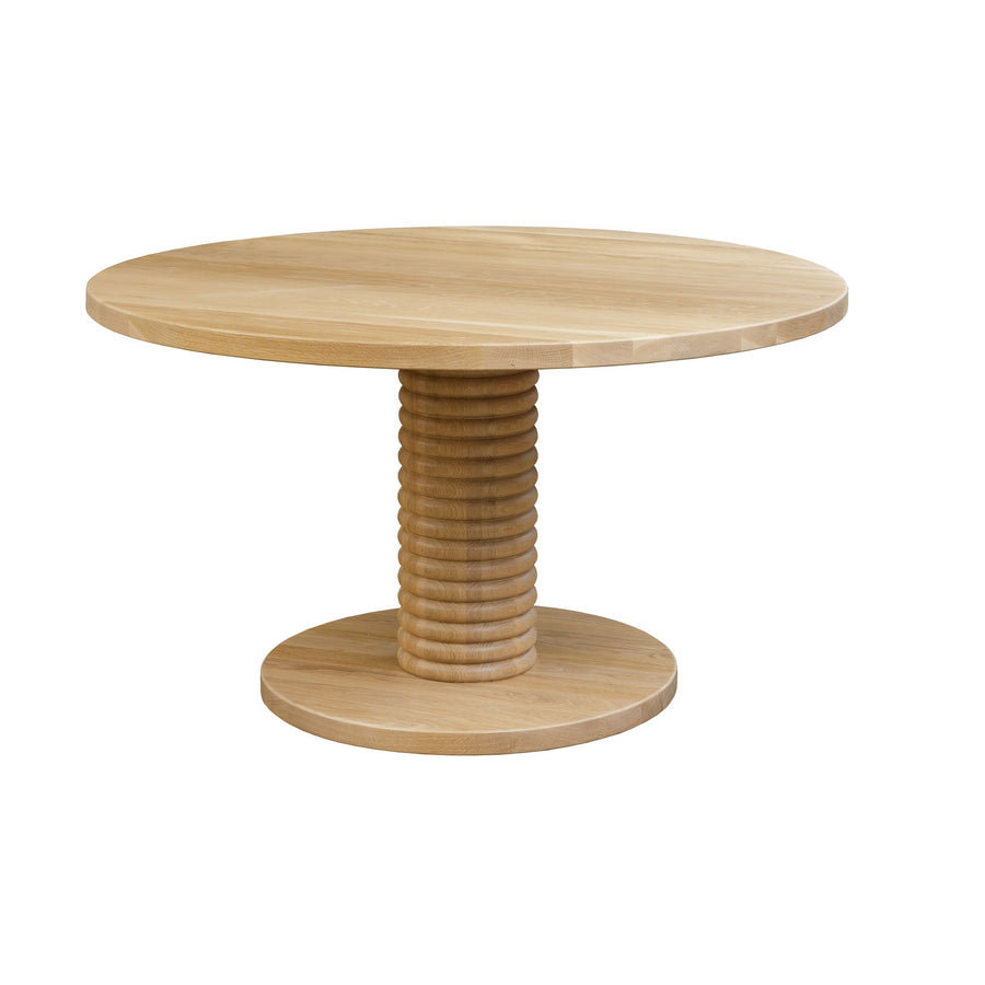 Round solid top pedestal table in pale white oak with a stacked ring column and wide round base on a white background