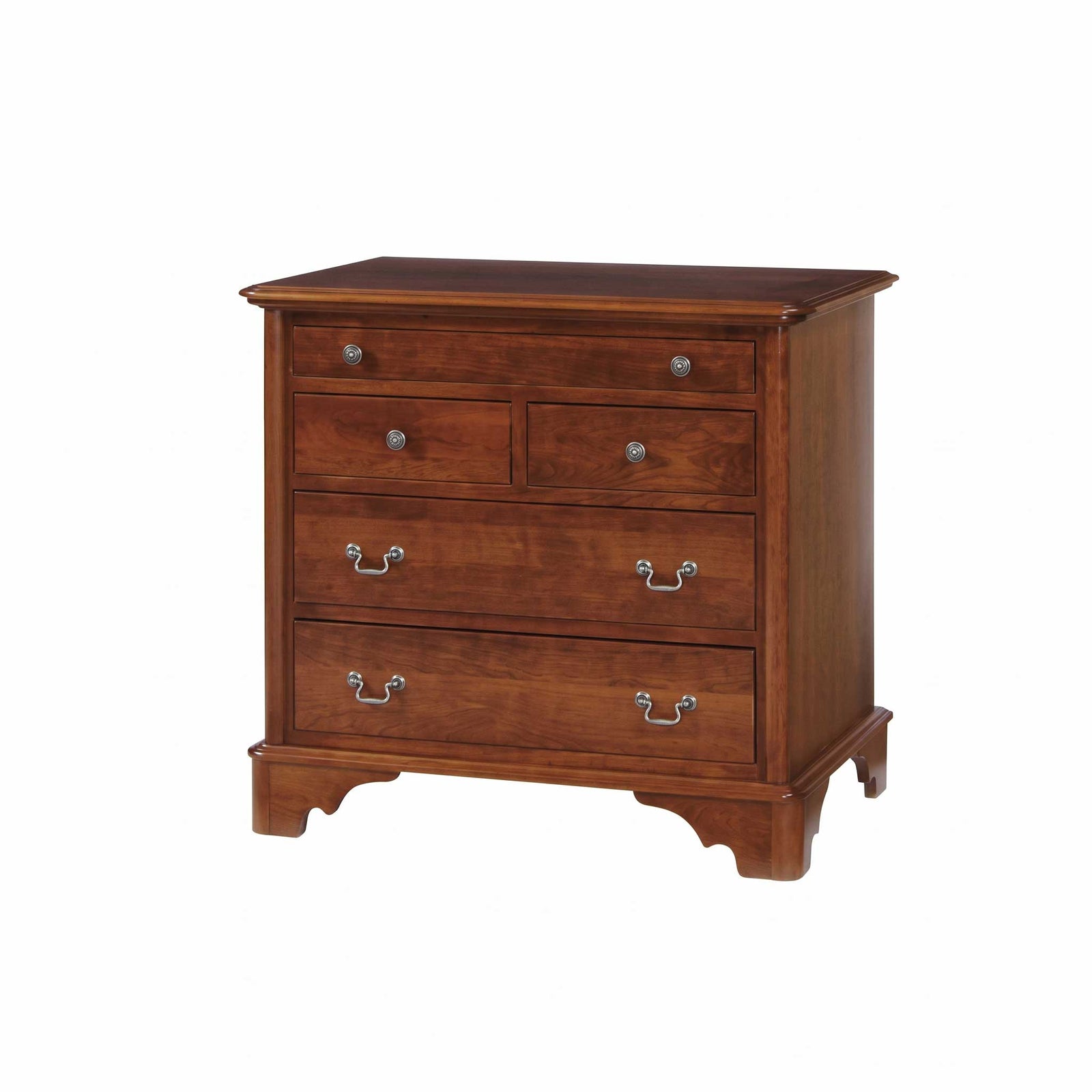 A warm brown wooden chest of drawers with six drawers and brass handles, styled in a bright room with a vase and framed print on top.