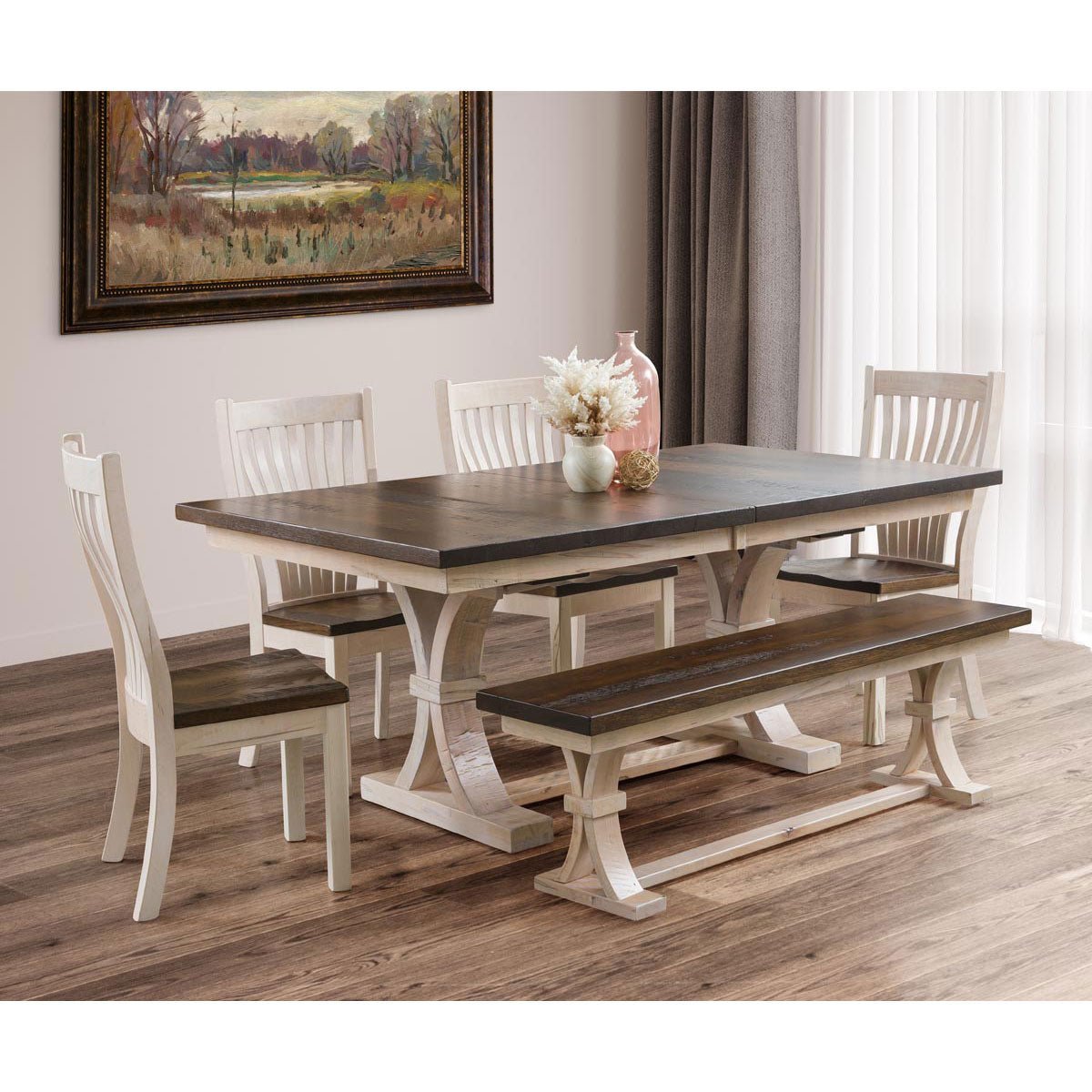 Two-tone dining room with a dark topped trestle table, four whitewashed slat back chairs and a matching bench