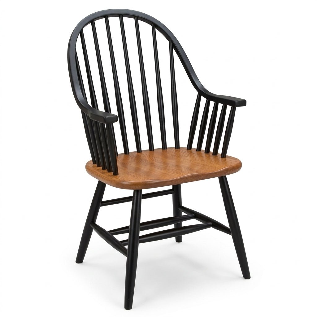 A spindle-back dining chair with a black painted frame and a warm medium-brown wooden seat, shown on a plain white background.