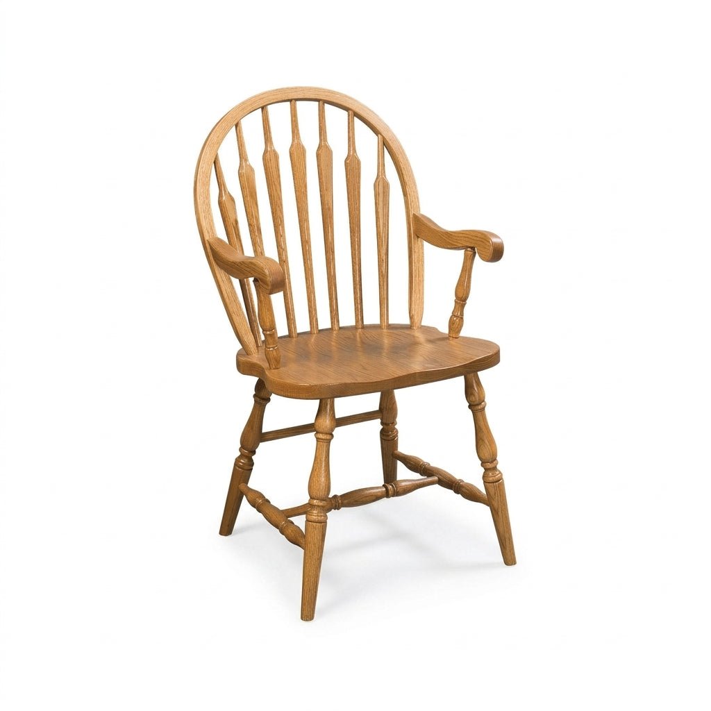 A classic wooden spindle-back chair with turned legs and armrests, shown from a three-quarter angle on a white background.