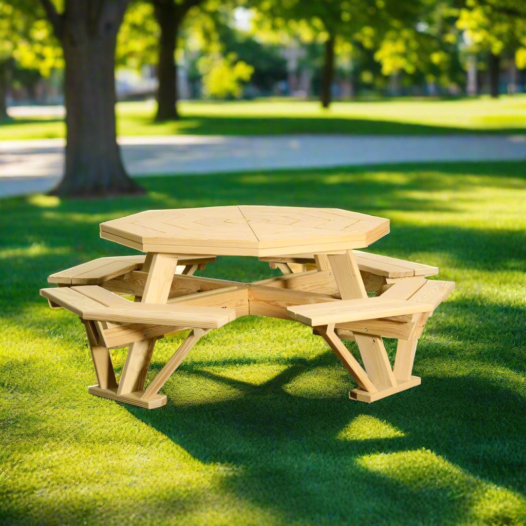 Octagon wooden picnic table seating eight with attached benches, in natural pine on a sunny park lawn