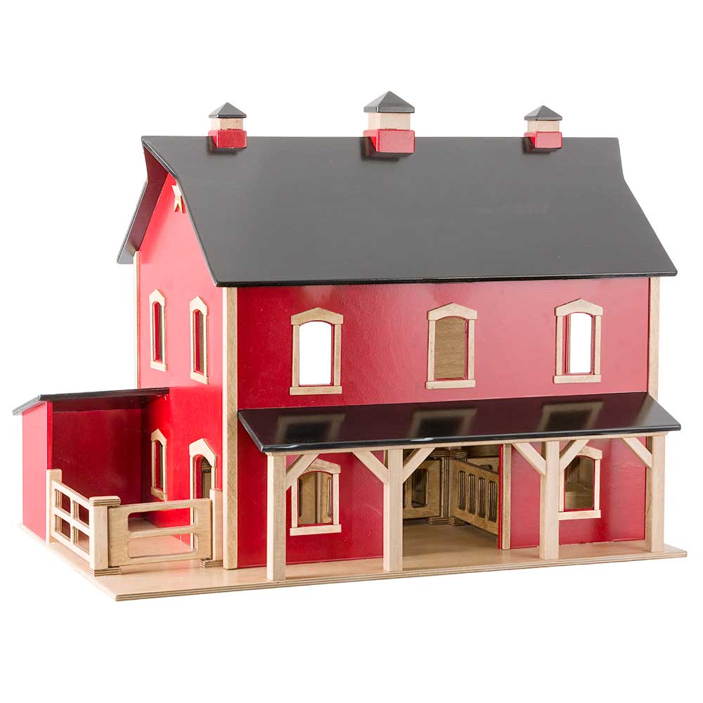Amish Wooden PA Barn Replica Toy shown in the child's playroom on a wood floor of a craftsman bungalow home