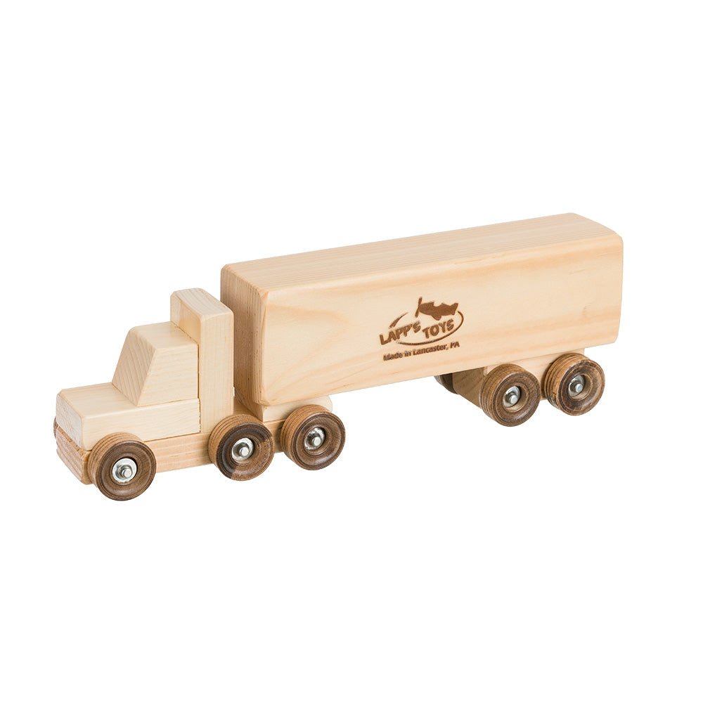 Pale maple toy semi box truck with a cab, long enclosed trailer, dark wheels and a burned Lancaster PA maker mark