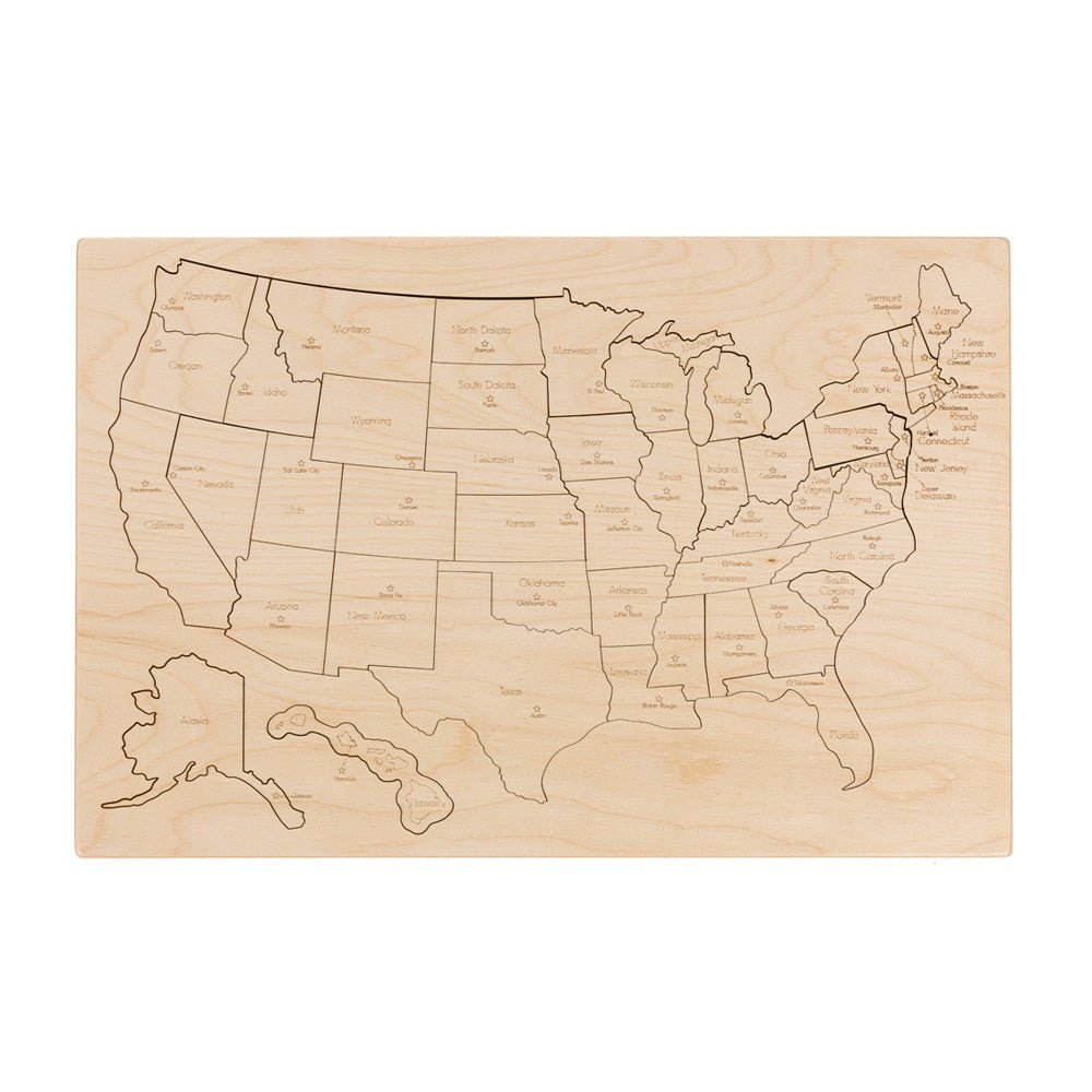 Wooden United States puzzle board with every state cut out and engraved with its name and capital city
