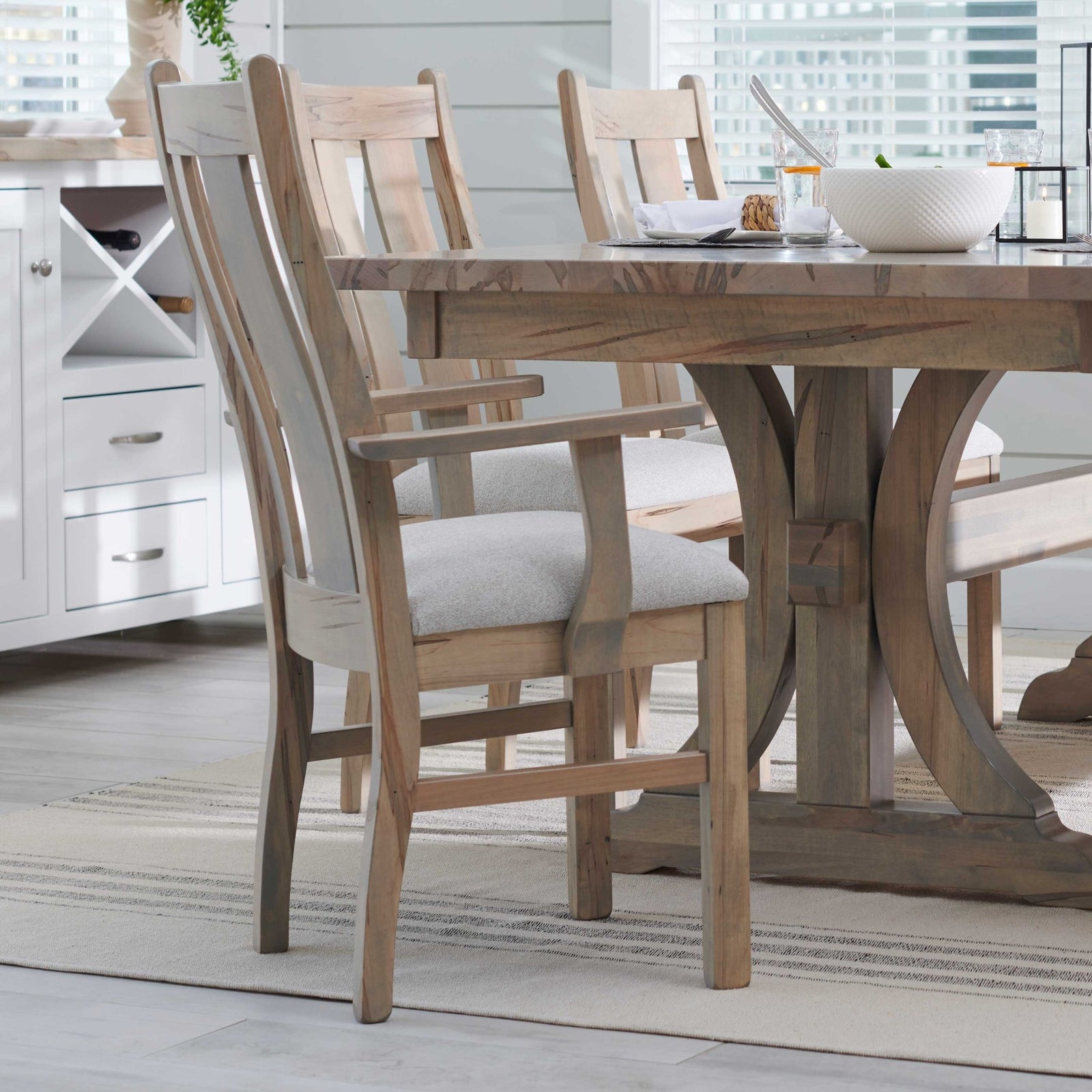 Gray stained dining side chair with a two-slat curved back, contoured wood seat and square tapered legs on a white background