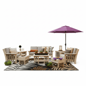 Ivory mission style patio set with slat sides, taupe cushions, ottomans, tables and a purple umbrella on a zebra rug
