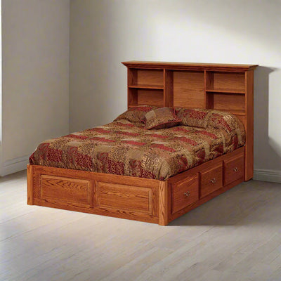 Oak bookcase headboard captain bed with open cubbies and three underbed drawers with brass knobs