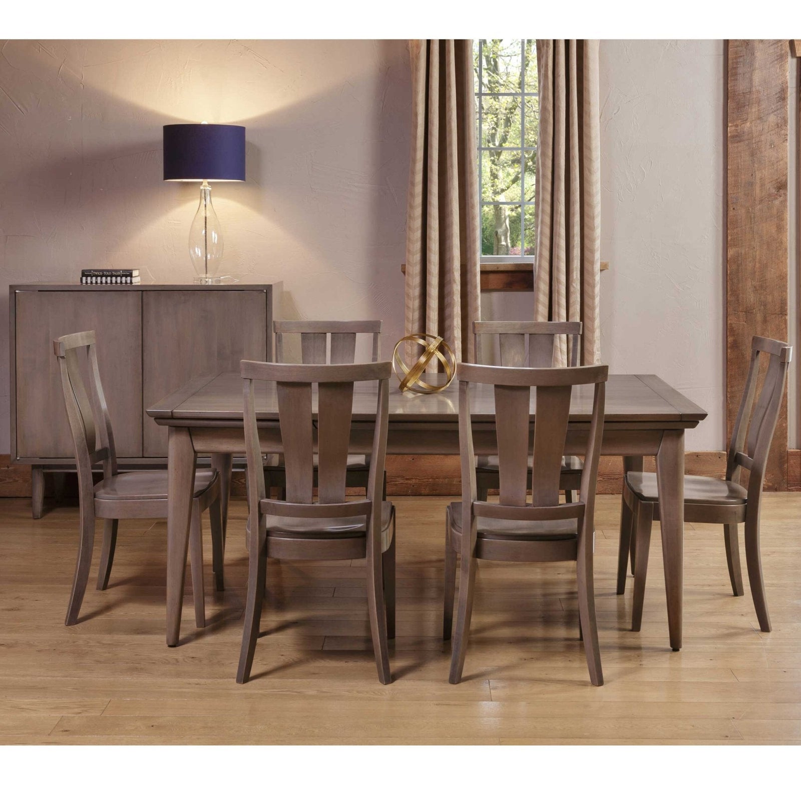 Gray stained dining set with a rectangular leg table, six splat back chairs and a matching sideboard buffet