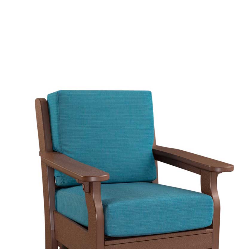 Close-up of a mahogany poly patio chair fitted with deep teal replacement seat and back cushions