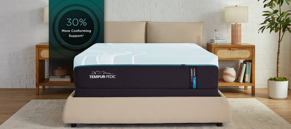 Ultimate pressure relief 13 inch mattress on a taupe platform bed with a badge noting 30 percent more conforming support