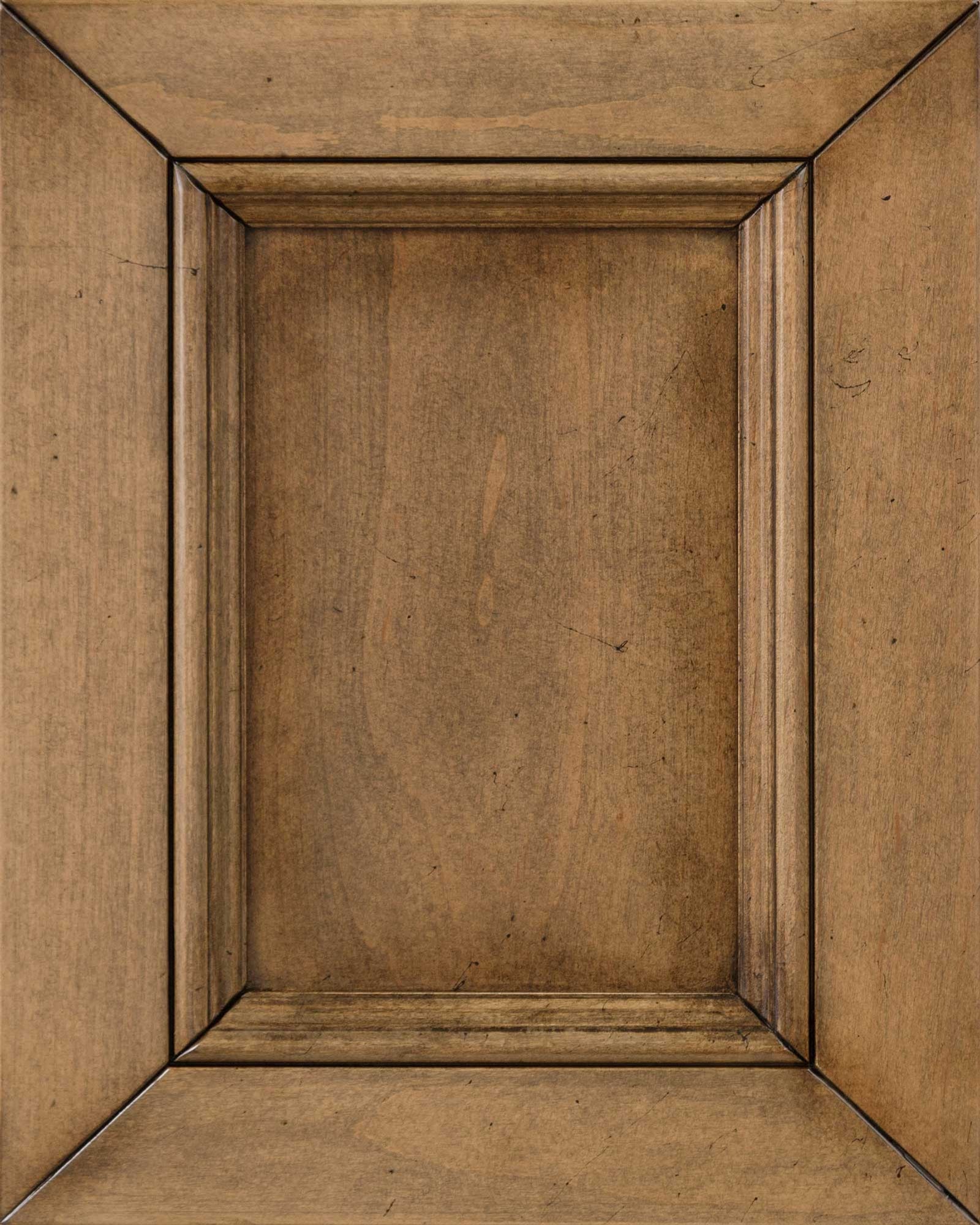 Vintage Yukon stain on maple wood sample, a mellow amber panel door with darker antiqued molding and smooth maple grain