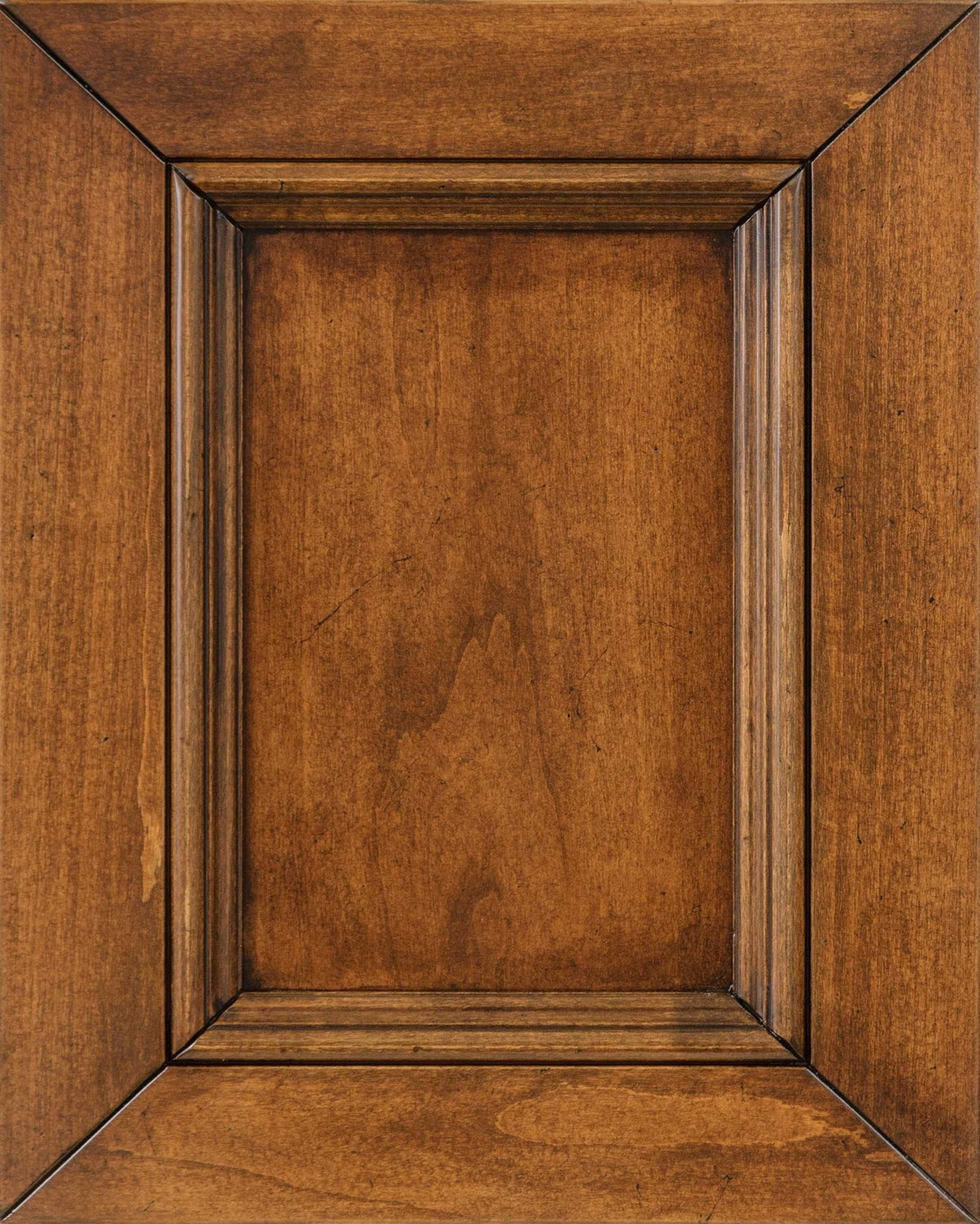Vintage Braddock stain on maple, a warm tan sample panel with antiqued dark molding lines and light distress fly specking