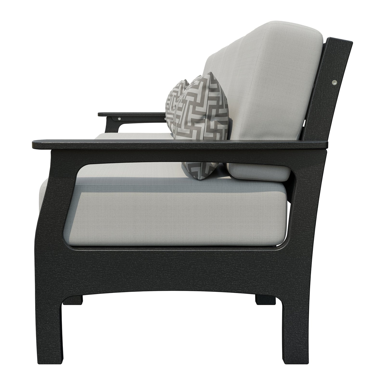 Six piece black poly patio sofa set with blue cushions, side tables and ottoman on a poolside patio