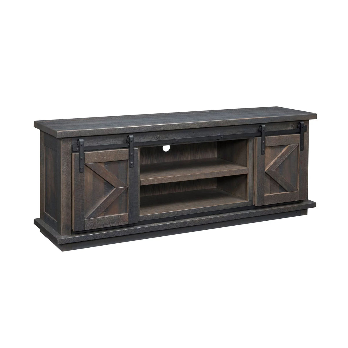 A rustic dark brown wooden TV stand with a weathered finish, featuring two barn-style sliding doors with black metal hardware and an open center shelf.