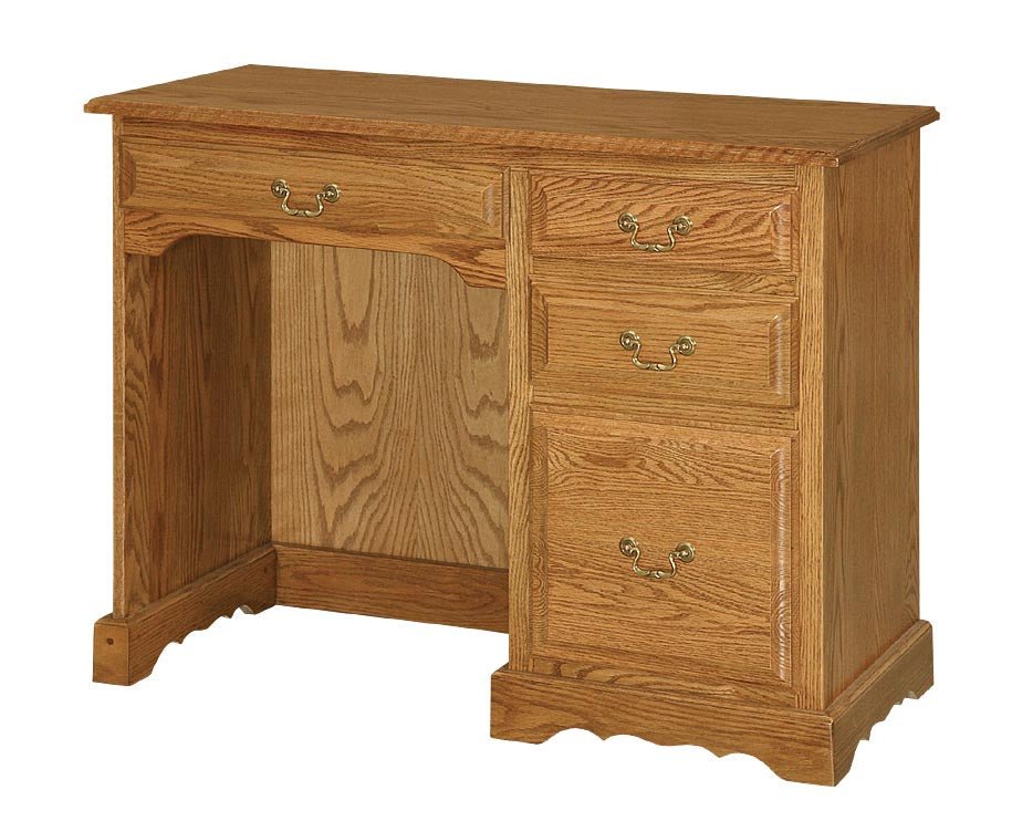 Golden oak student writing desk with a scalloped apron, four drawers and brass swing bail pulls