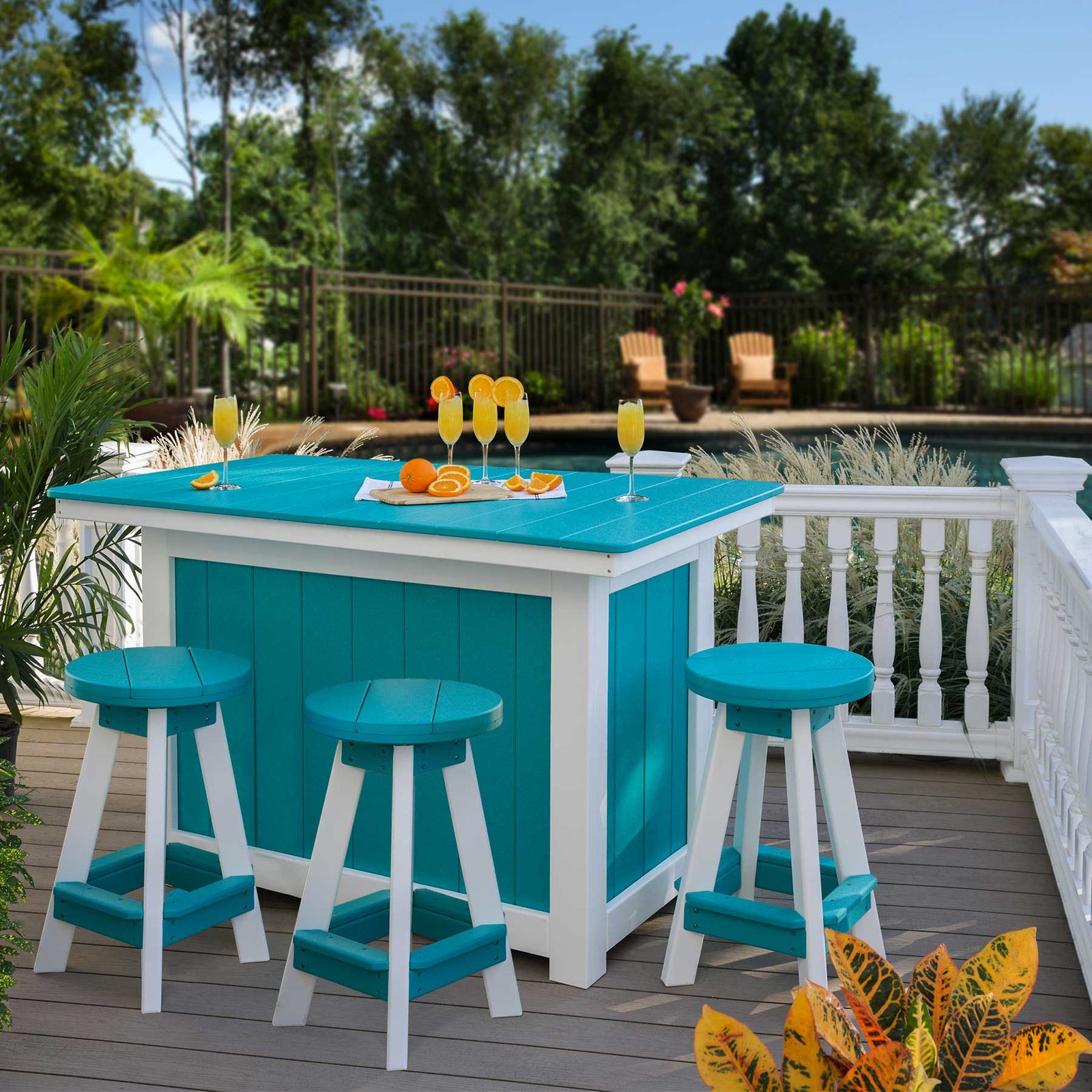 Aruba blue poly island bar with a white base, plank top and three matching round stools on a pool deck