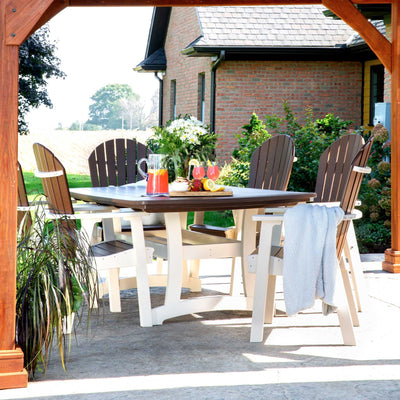 Rectangular brown and white poly patio dining table set with six fan-back chairs under a wood pergola