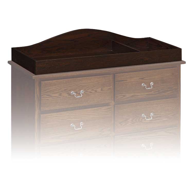 Dark stained solid wood changing station topper with an arched back and divided tray shown on a faded dresser