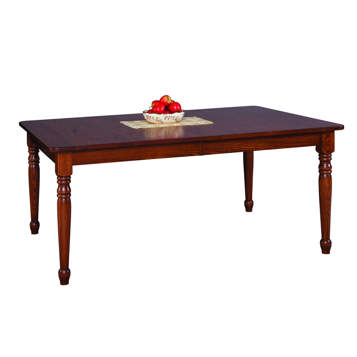 Expandable rectangular dining table in medium oak with turned legs, styled with a bowl of red apples