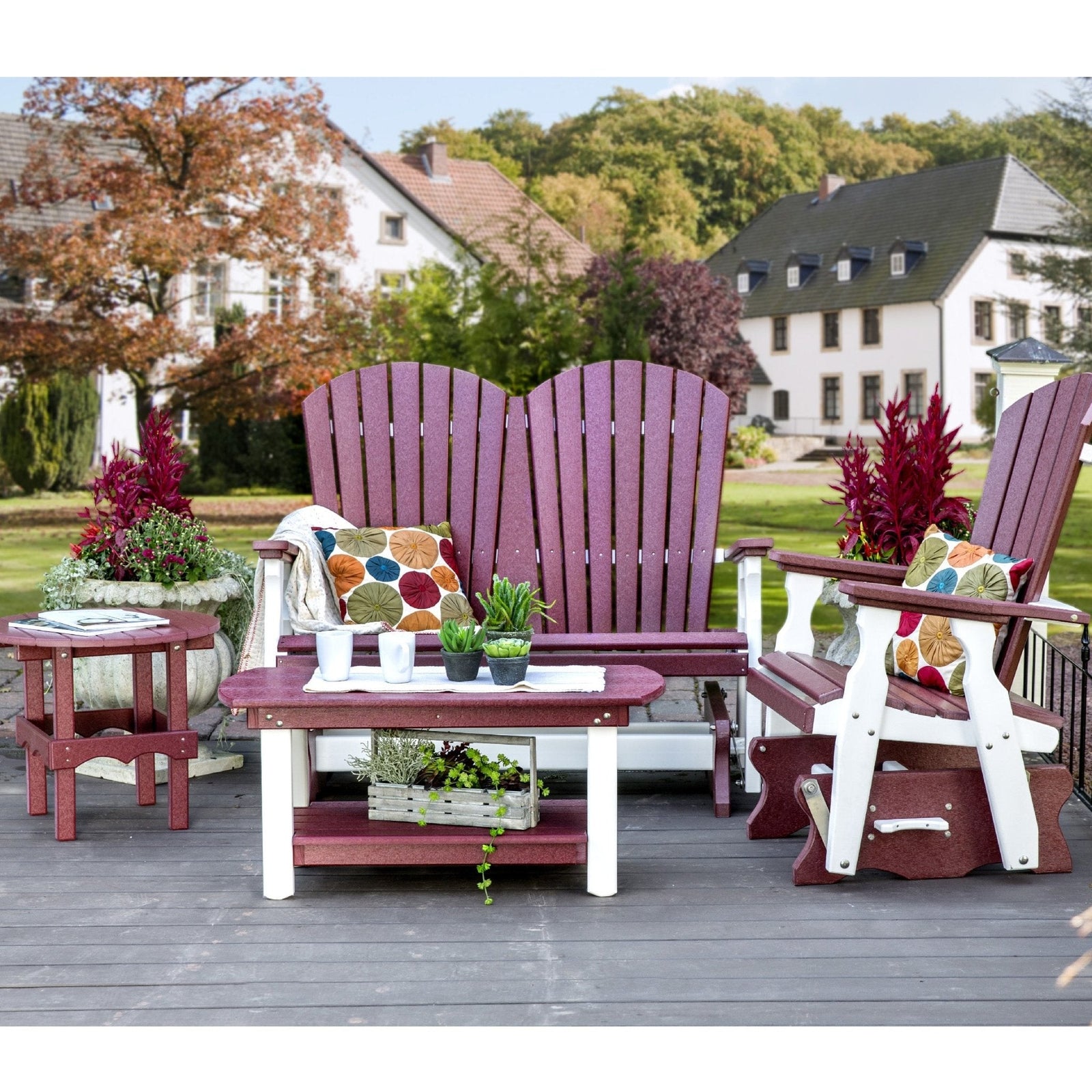 Cherrywood and white poly patio settee for two with a matching glider chair, coffee table and end table