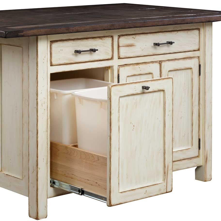 Cream kitchen island with one door open revealing a pull-out double trash bin below two drawers