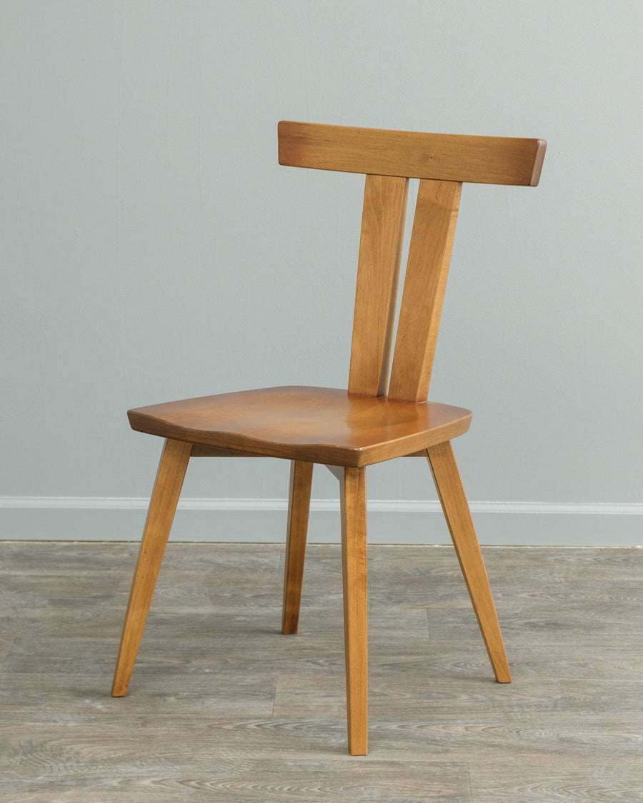 Astoria mid century dining chair in cherry with a T-back crest, split splat, saddle seat and splayed round legs