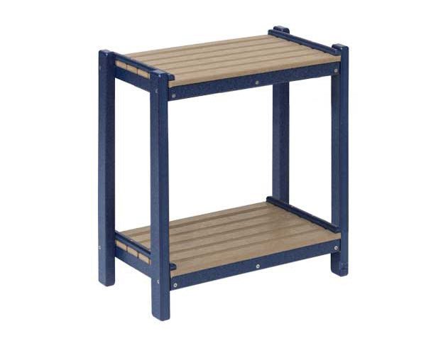 Navy and weathered wood poly side table with two slatted shelves and square legs, on a white background