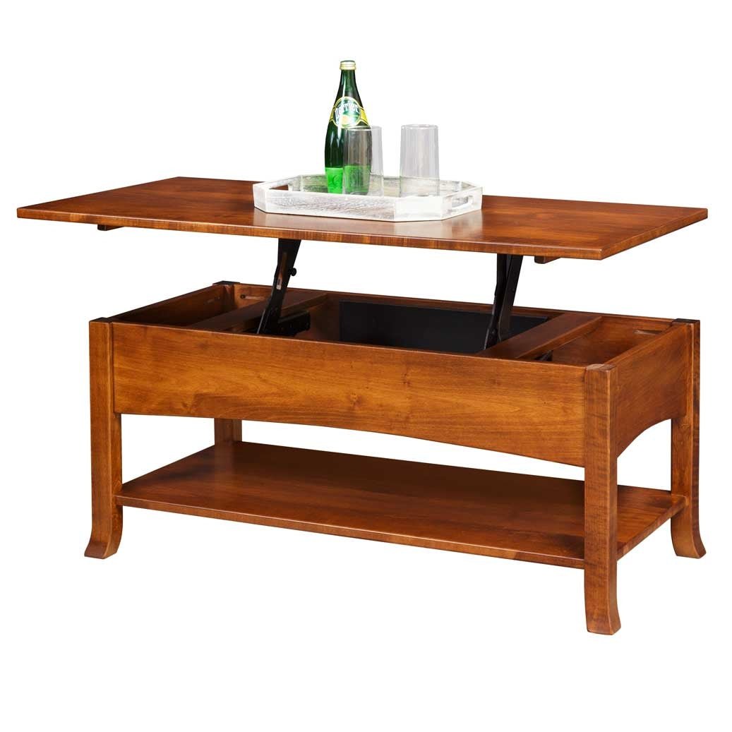 Lift top coffee table raised to laptop height holding a bottle and glasses beside a patterned chair by a window