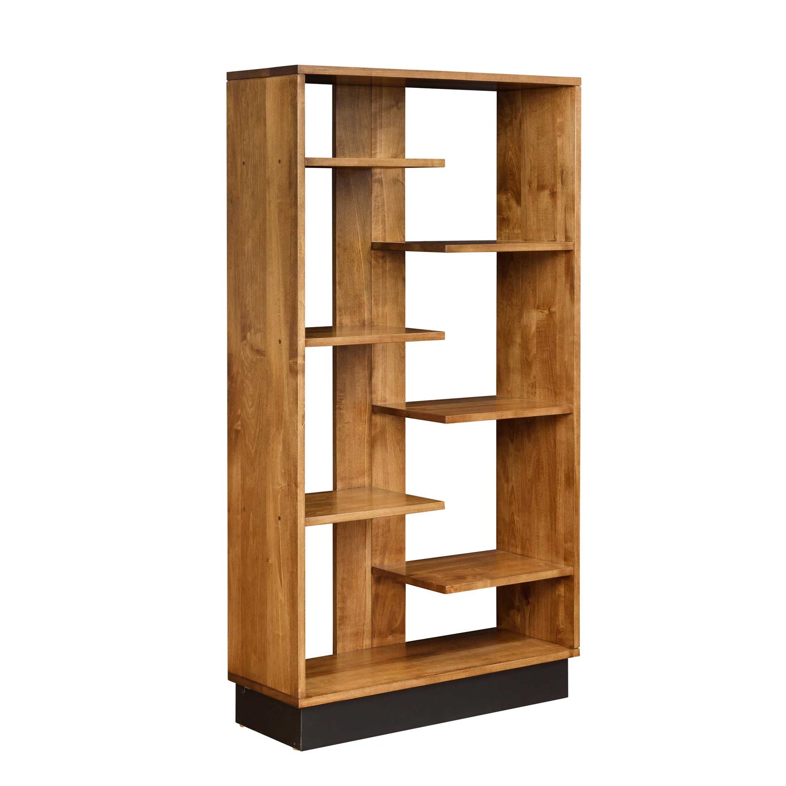 Modern staggered floating shelf bookcase in honey wood styled with books, plants and decor on a black plinth