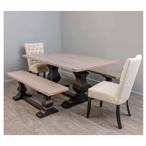 Trestle dining set with a weathered gray top, black bases, plank bench and two linen upholstered side chairs