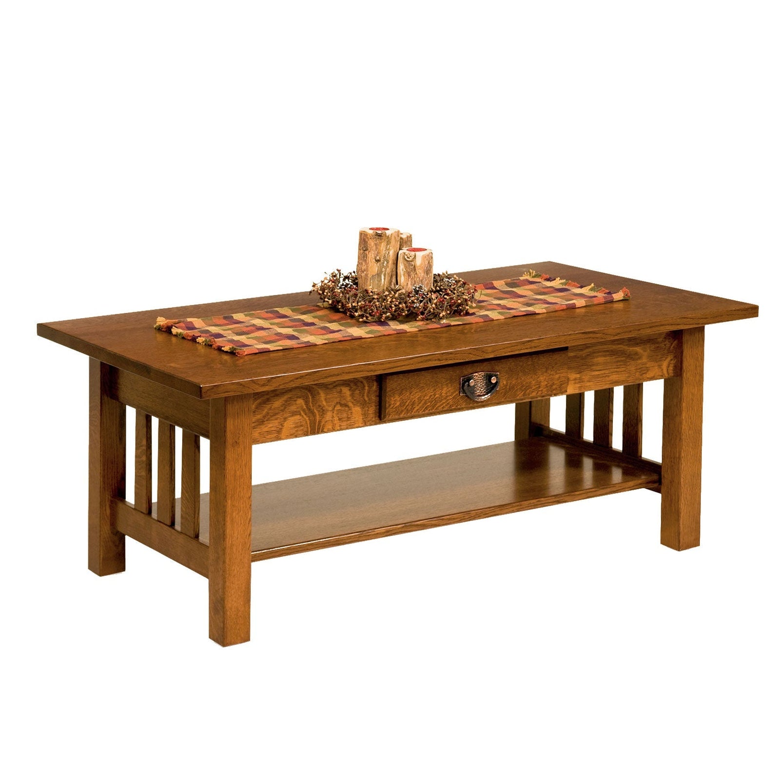 Mission oak coffee table with drawer and lower shelf styled with decor beside a reclining sofa and rocker