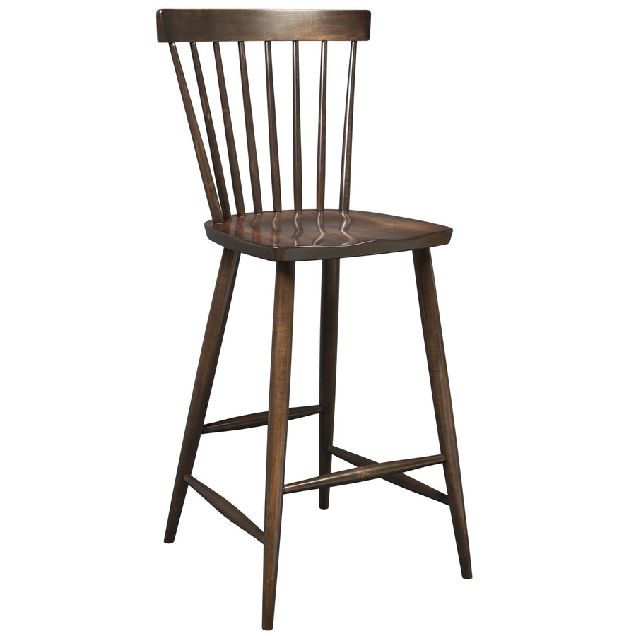 Dark walnut Windsor bar stool with a spindle back, sculpted seat and crossed footrest stretchers on white