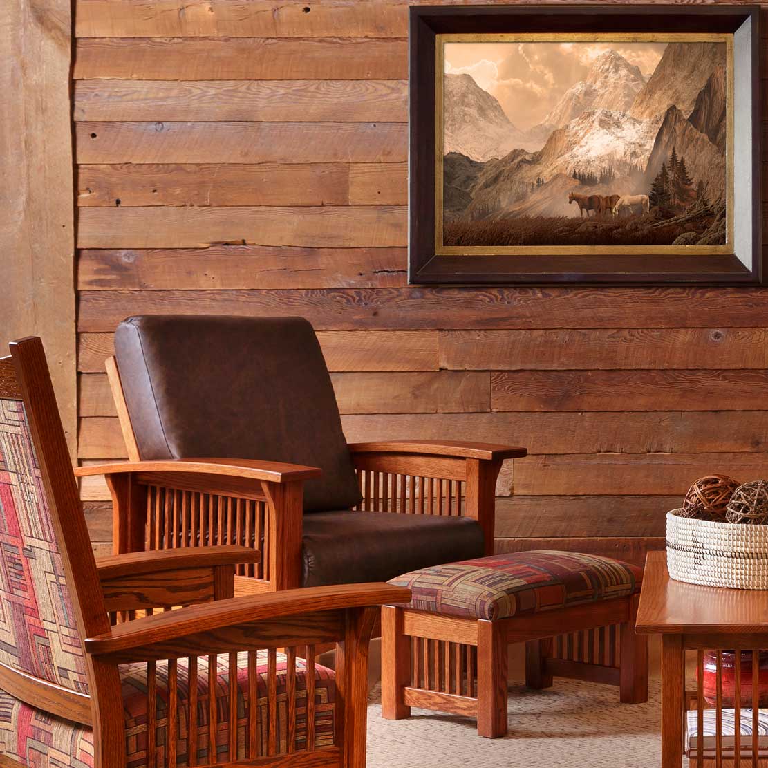 Brown leather Morris chair with a patterned ottoman and second slatted chair against a reclaimed wood wall