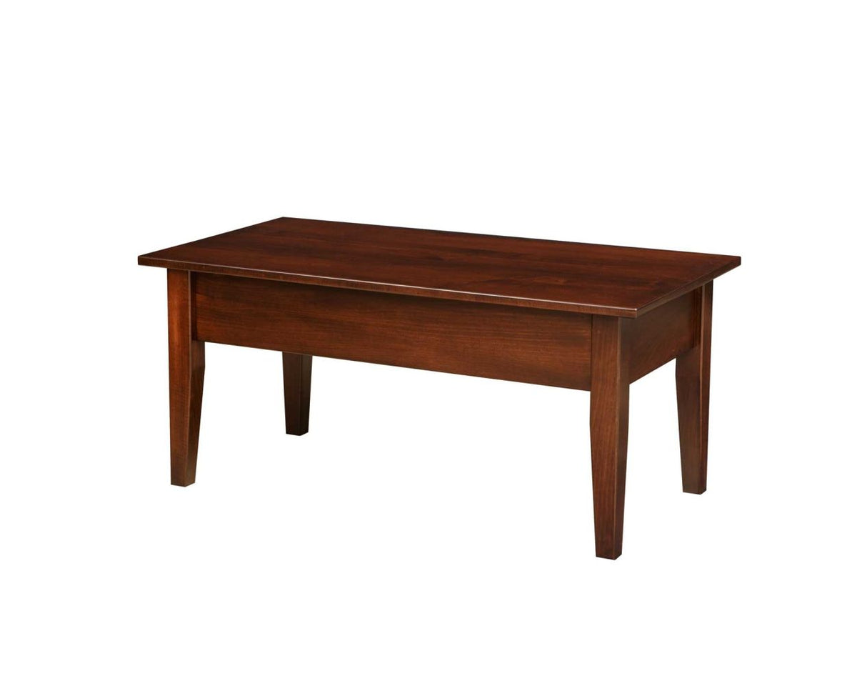Solid wood Shaker coffee table in a warm cherry stain with clean apron, beveled top edge and four tapered legs