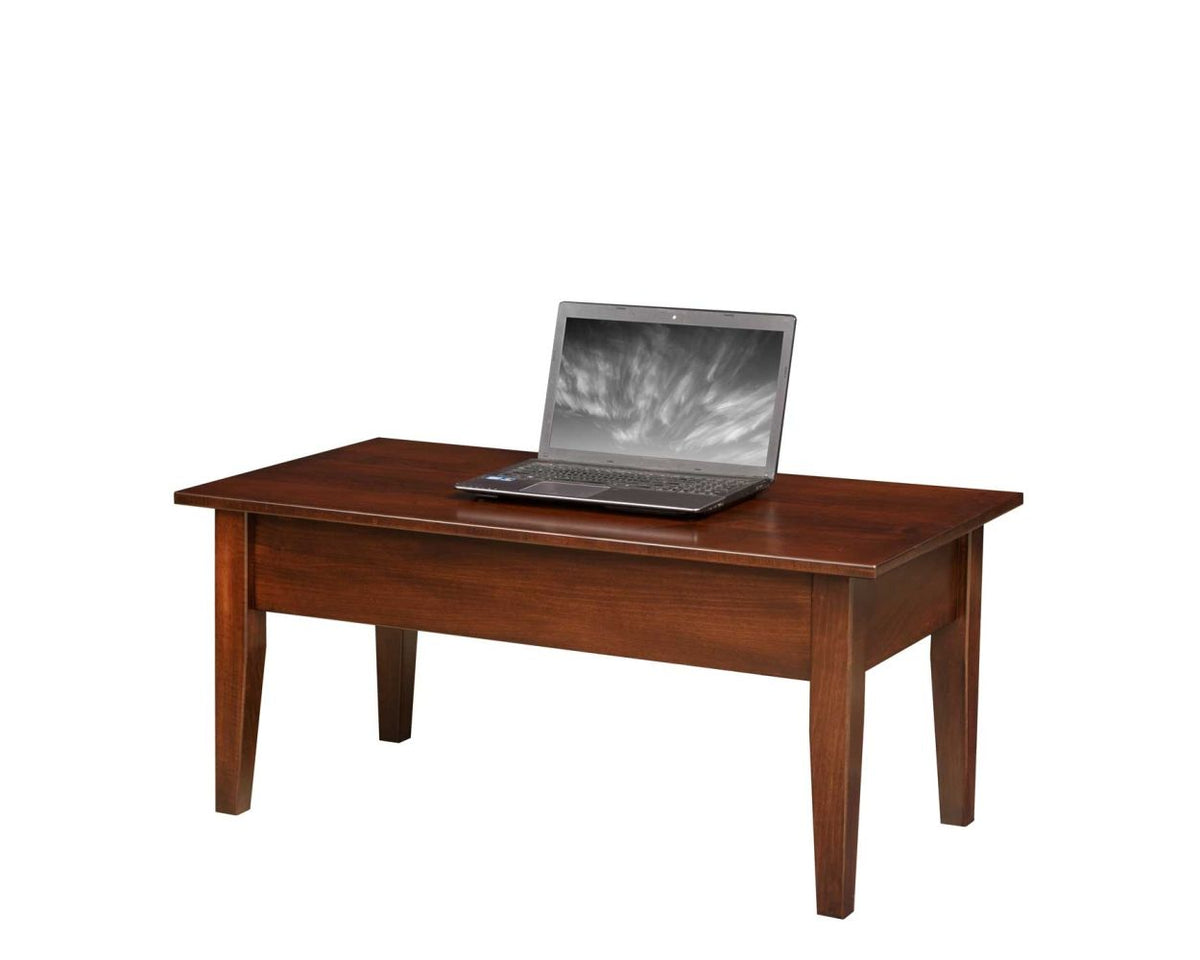 Cherry finish Shaker coffee table with the lift top closed flat and a laptop on the surface, shown on a white background