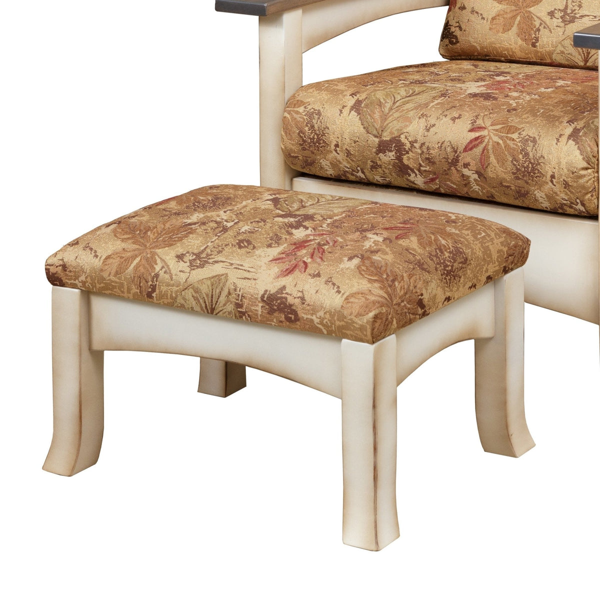 Cream painted wood frame ottoman with an autumn floral tapestry cushion beside a matching upholstered chair