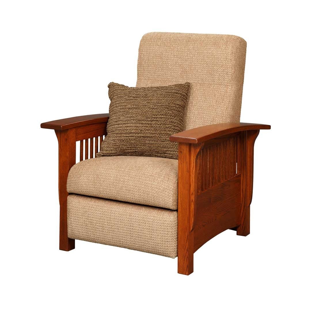 Angled view of a tan fabric Mission recliner with oak spindle sides, arched apron and wide flat wooden arms