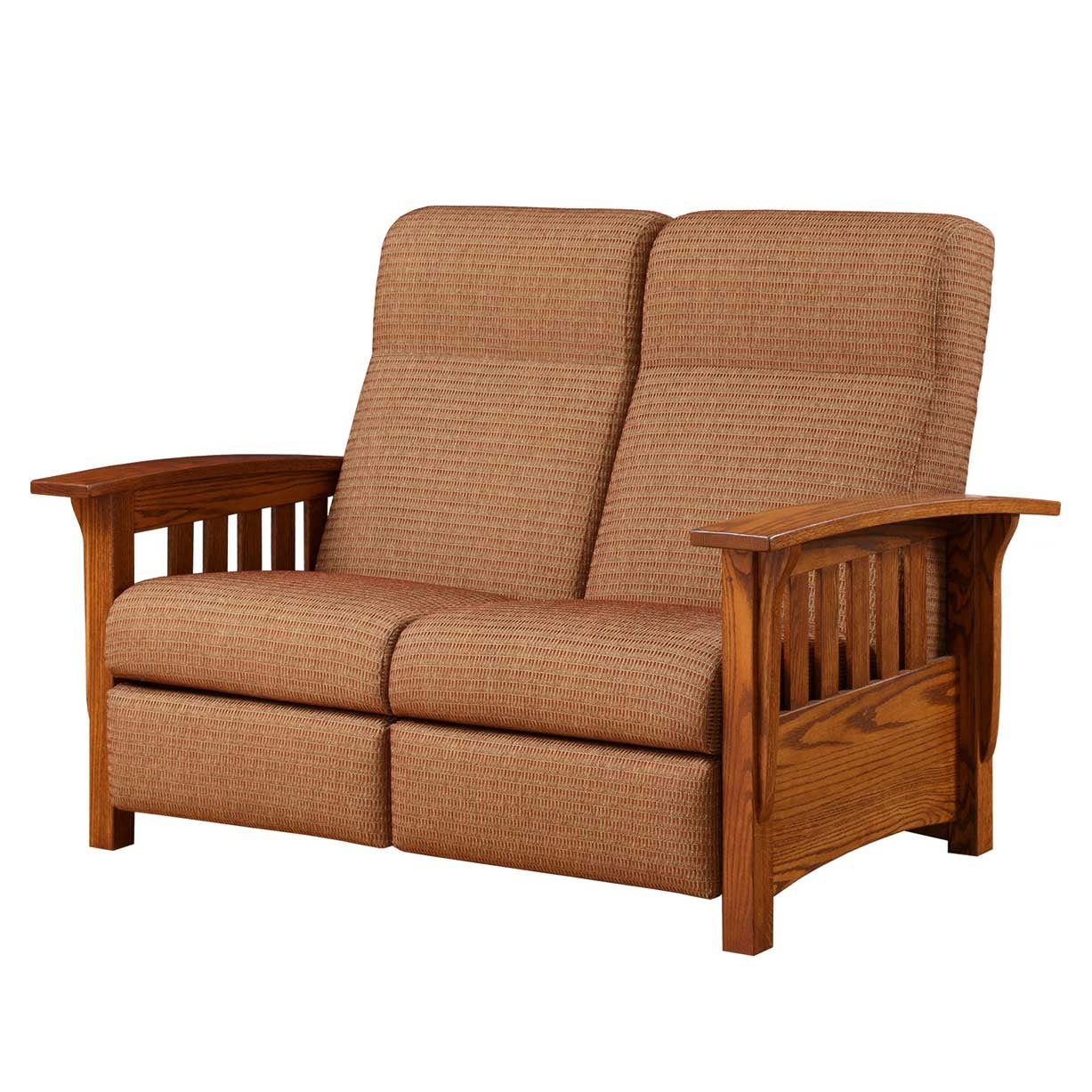 Rust brown fabric Mission reclining loveseat with oak slat sides, accent pillow and a fern planter alongside