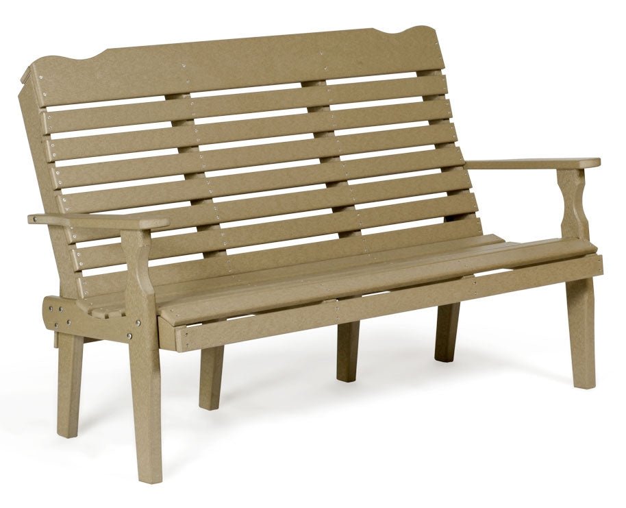 Weatherwood poly 5 foot patio bench with slatted curved back and blue striped pillows on a flagstone patio overlooking a lake