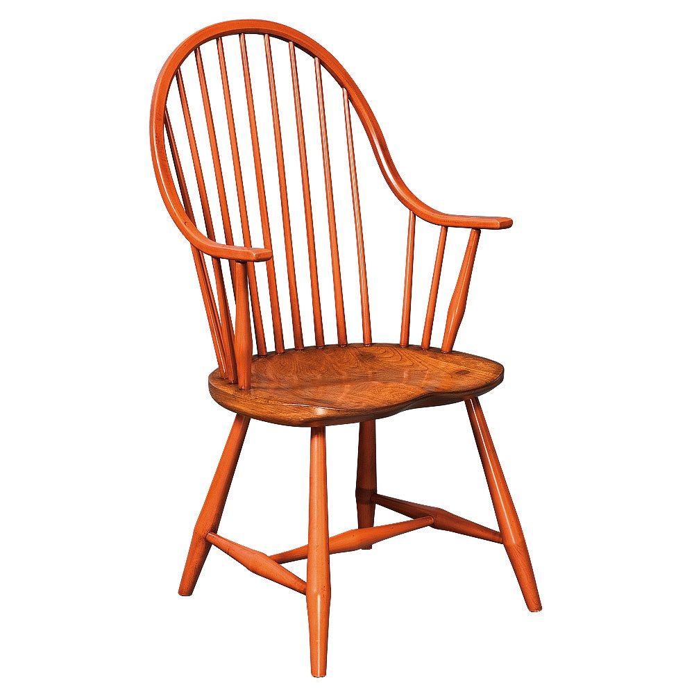 Continuous arm Windsor chair painted burnt orange with a natural stained shaped seat and turned splayed legs